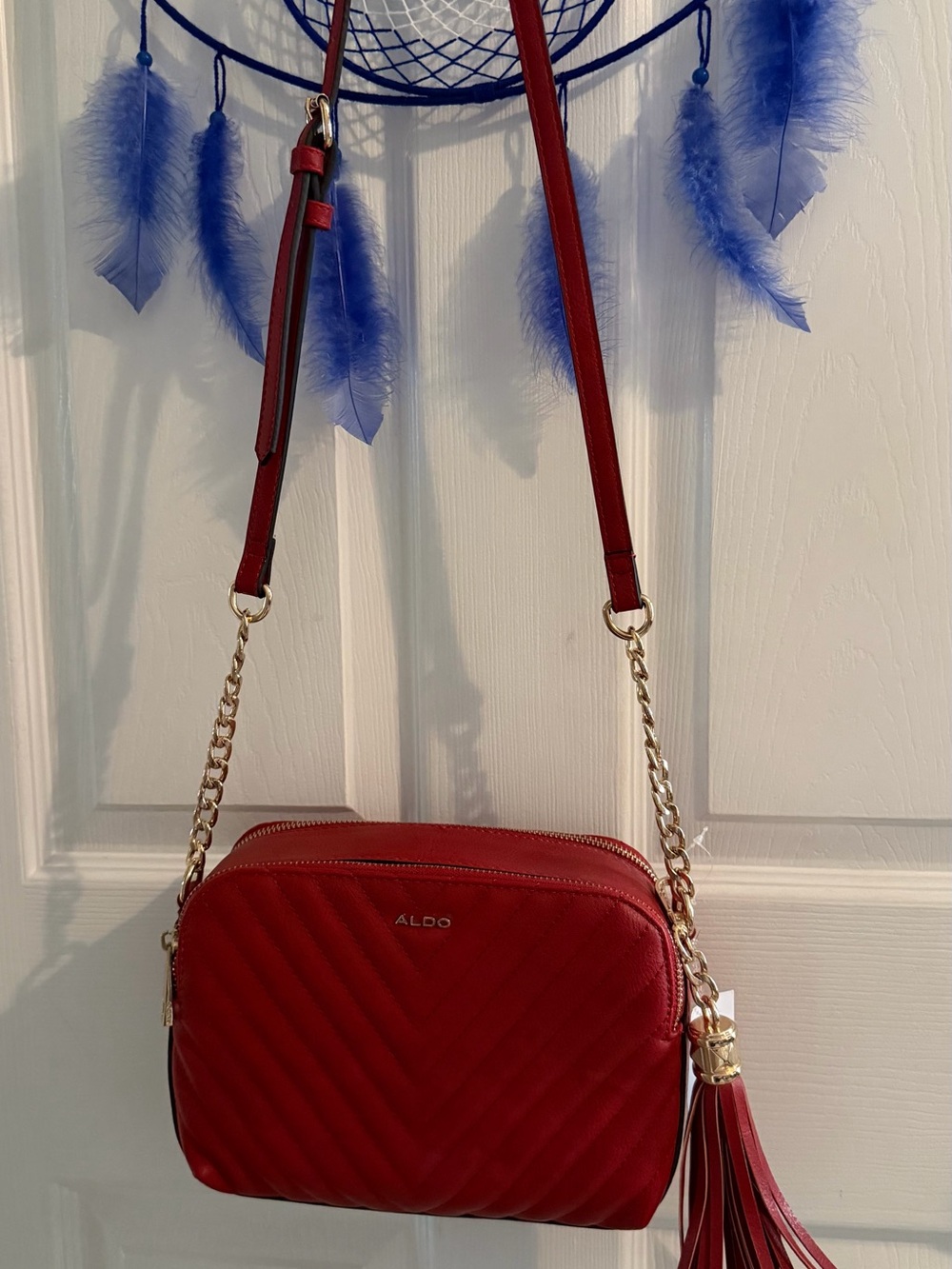 ALDO Red Quilted Crossbody Bag with Tassel Charm